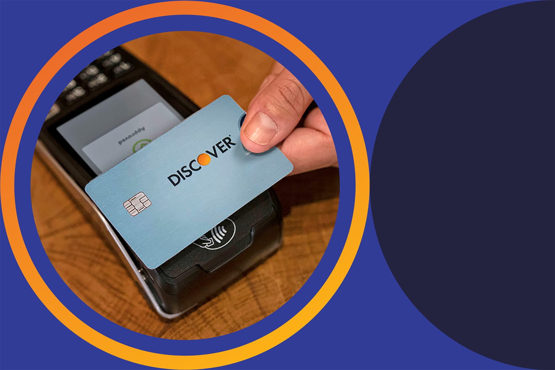 close up view of contactless discover card payment