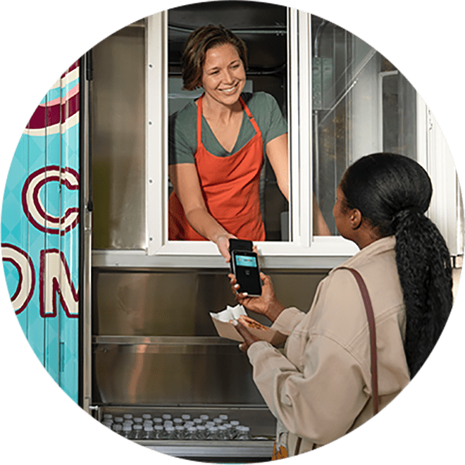 customer paying at window